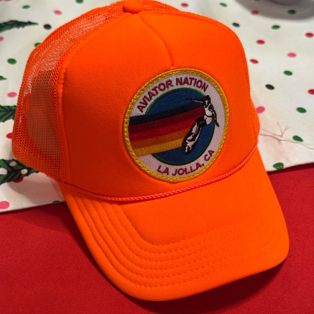 New with tags, Aviator Nation neon La Jolla trucker hat, orange.